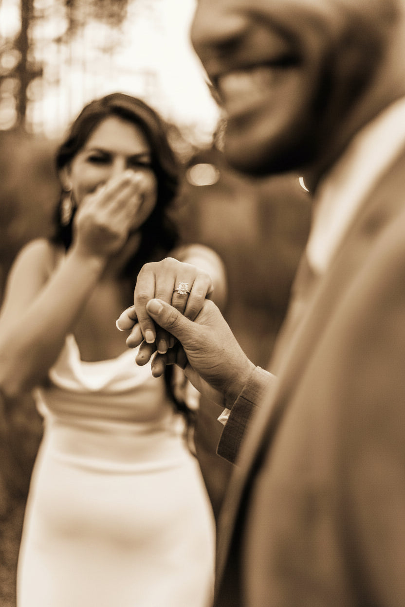 A proposal — hands together with an engagement ring